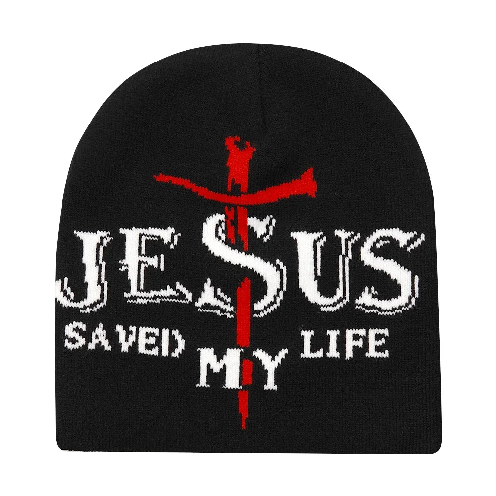 Black beanie with 'Jesus Saved My Life' text and red cross design on a white background