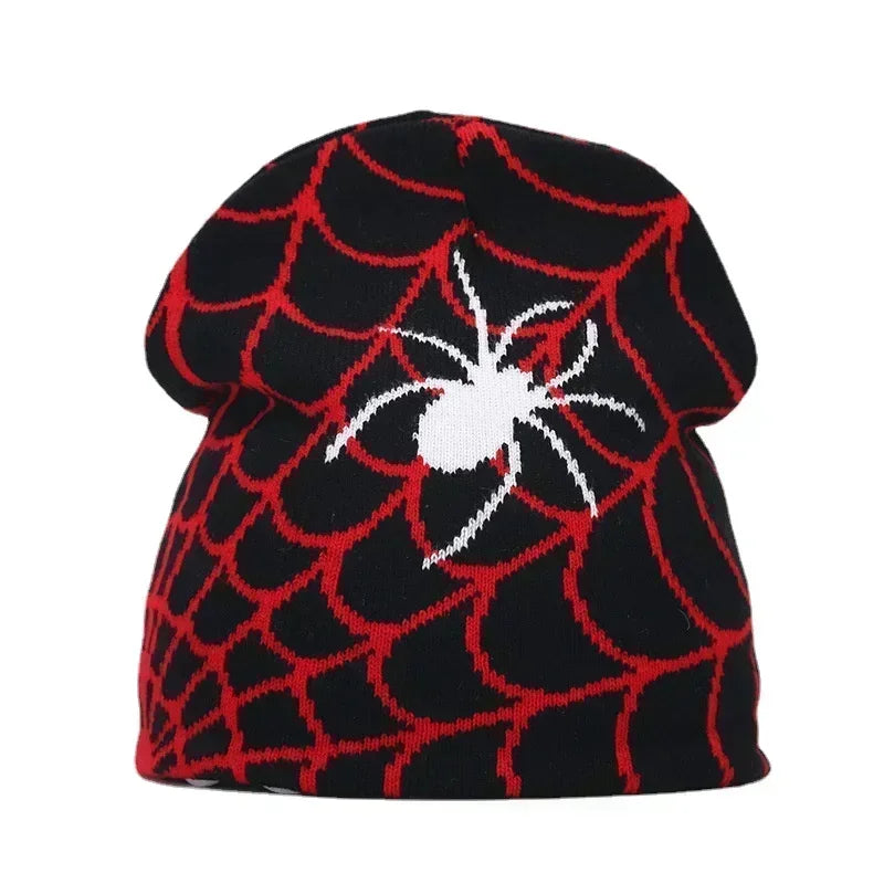 Black beanie with red spider web pattern and white spider design on a white background