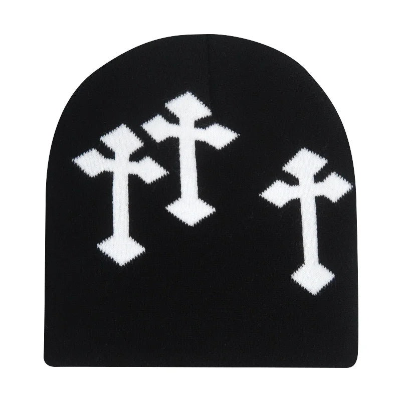 Black beanie with white cross patterns on a white background