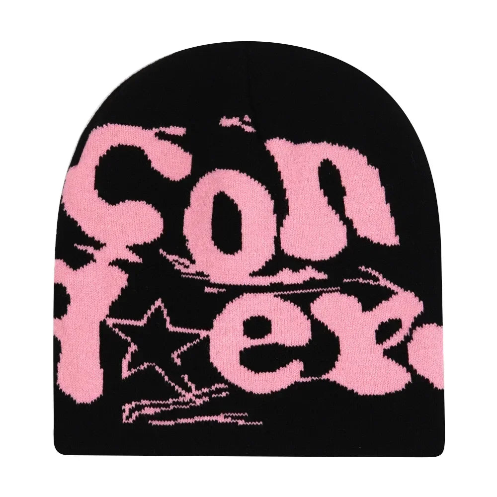 Black beanie with pink text and star design on a white background